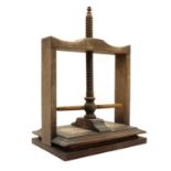 A 19th century mahogany napkin press,
