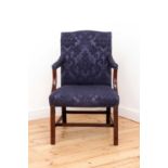 A George III mahogany Gainsborough armchair,