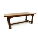 A large oak refectory table,