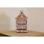 A French faience model birdcage,