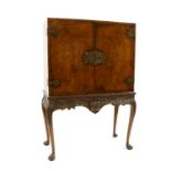 An 18th century walnut two door cabinet