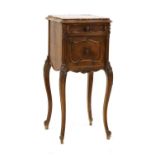 A French Louis XV-style walnut bedside cupboard,