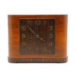 An Art Deco walnut and rosewood mantel clock,