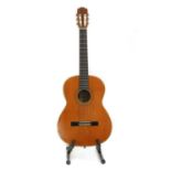 A Takamine C132s classical guitar,