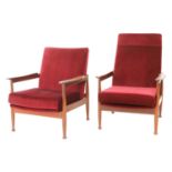 Two afrormosia 'Manhattan' armchairs,