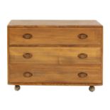An Ercol elm chest of drawers,