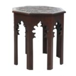 An octagonal mahogany lamp table,