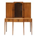 A Gordon Russell Art Deco walnut breakfront cabinet,