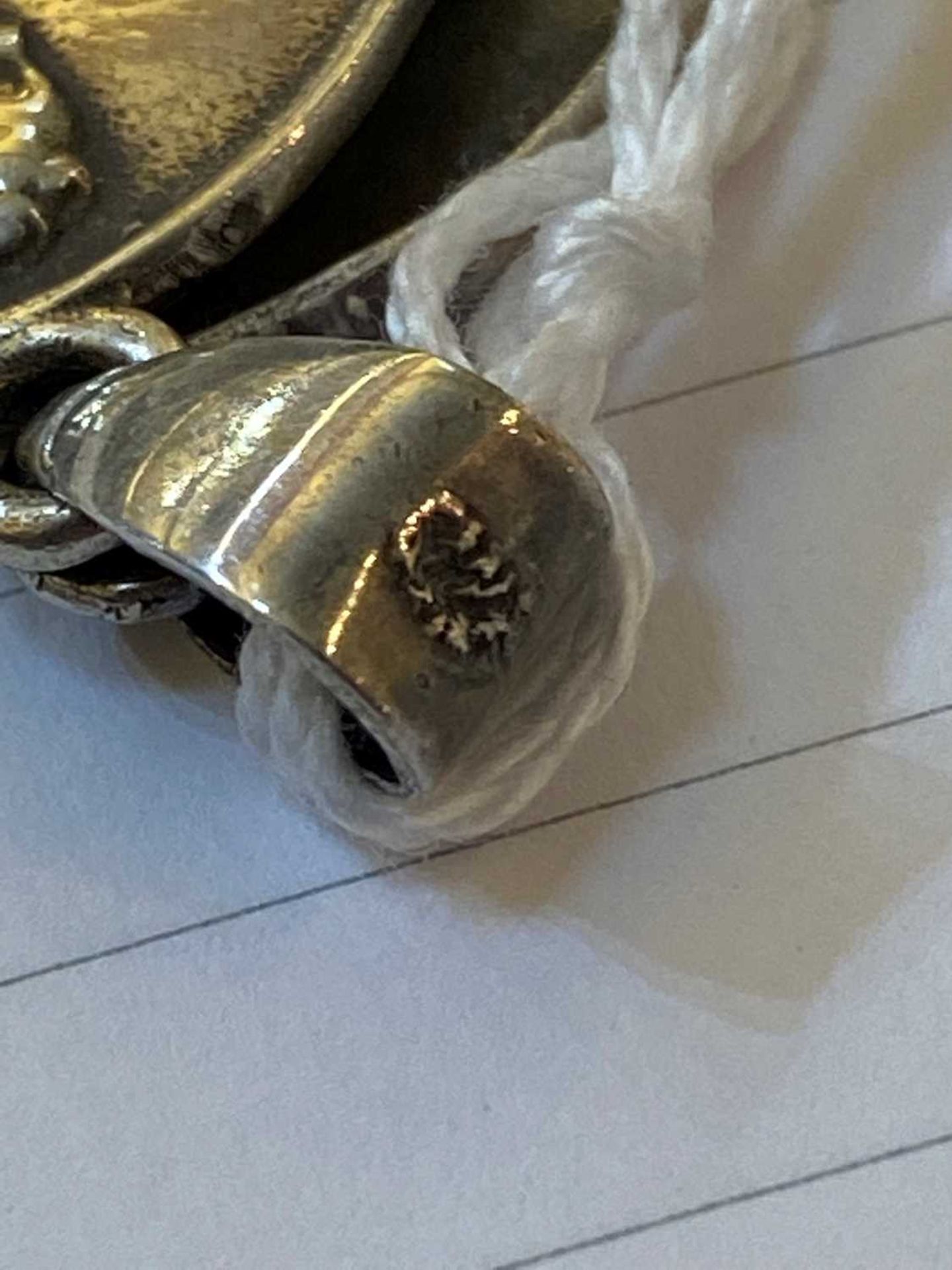 A white metal locket, - Image 4 of 6