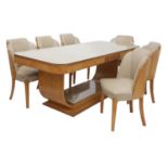 An Art Deco burr maple dining suite,