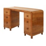 An Heal's walnut desk,