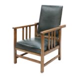 An Arts and Crafts oak reclining armchair,