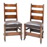 A pair of American Arts and Crafts oak side chairs,