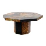 A brutalist octagonal slate coffee table,