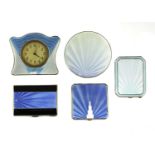 Three silver and enamelled ladies' compacts,