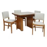 An Art Deco bird's-eye maple extending dining table,