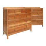 A pair of Cotswold School limed oak chests,