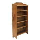 An Arts and Crafts oak bookcase,