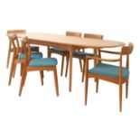 A Danish teak extending dining table,