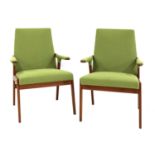 A pair of teak armchairs,