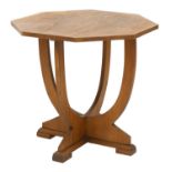 An Art Deco walnut octagonal lamp table,