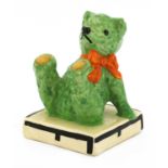 A Clarice Cliff teddy bear bookend,