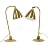 Two pairs of contemporary Bestlite lamps,