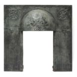 An Arts and Crafts verdigris patinated fireplace insert,