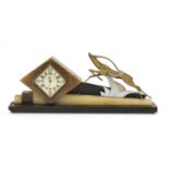 An Art Deco marble and onyx mantel clock,