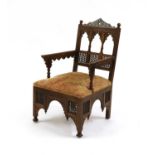 An Aesthetic Movement Moorish mahogany armchair,