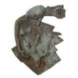 A patinated bronze wall sculpture,