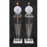 A pair of Lucite lamps,