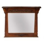 An Arts and Crafts Hampshire School oak overmantel,