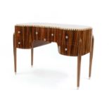 An Art Deco-style 'DK113' Macassar ebony desk,