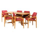 A teak extending dining table,