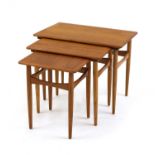 A nest of teak tables,