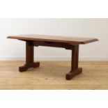 An Art Deco mahogany 'Token Works' dining table,