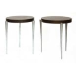 A pair of stained oak side tables,