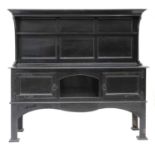 An Arts and Crafts ebonised sideboard,