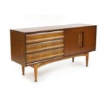 A teak and brass-mounted sideboard,