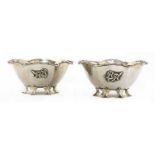 A pair of Arts and Crafts silver bowls,