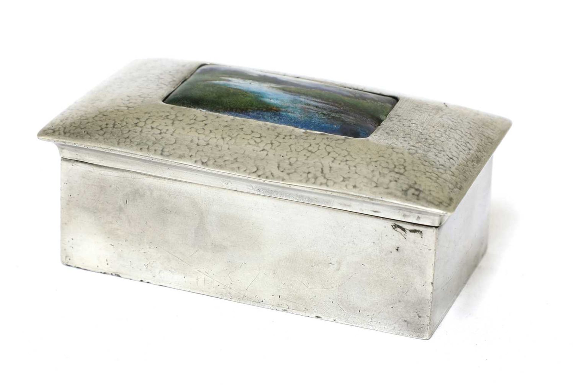 A Liberty Tudric pewter and enamel jewellery box,