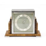 An Art Deco walnut and rosewood mantel clock,