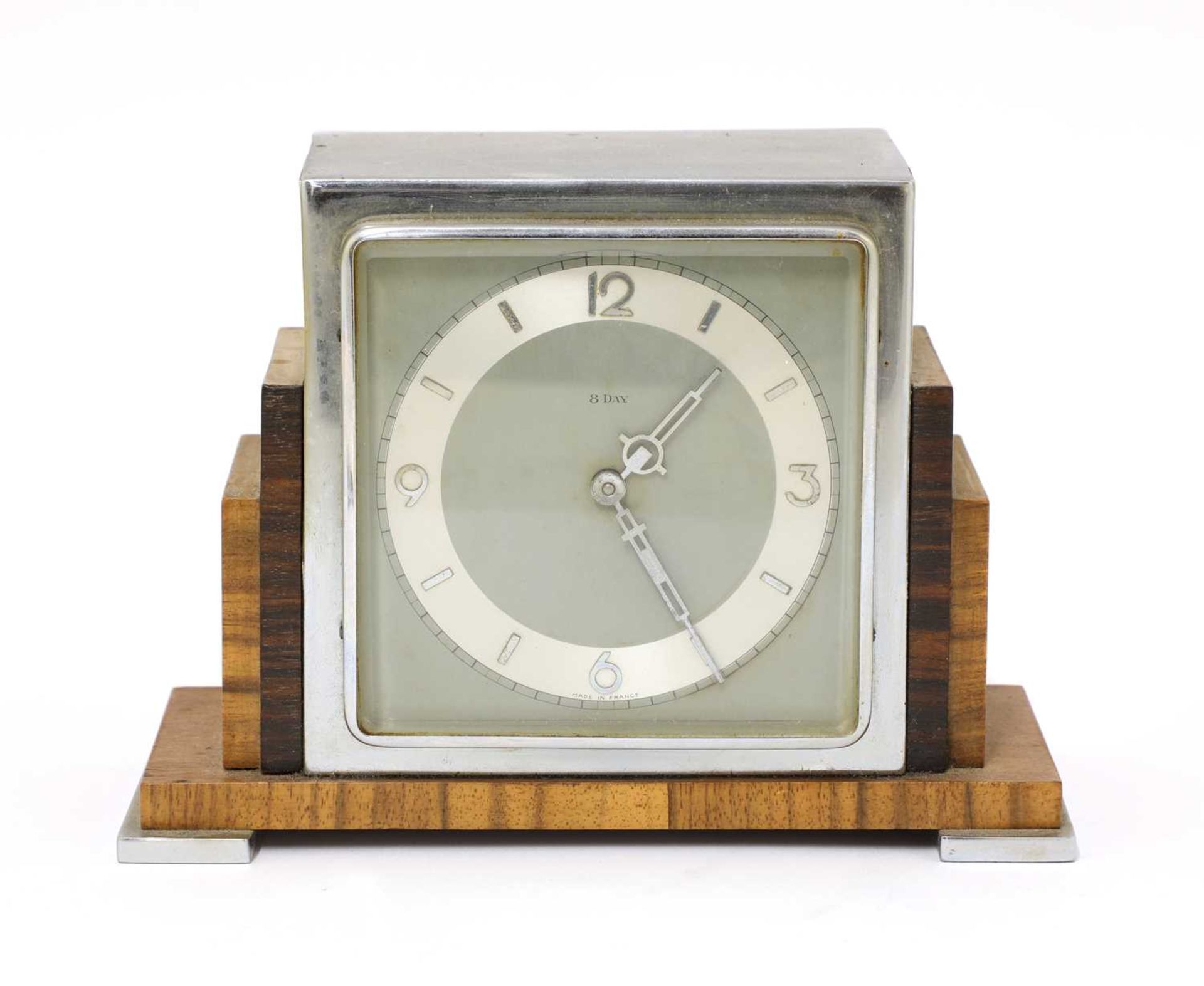 An Art Deco walnut and rosewood mantel clock,