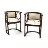 A pair of Viennese Secessionist 'Fledermaus' armchairs,