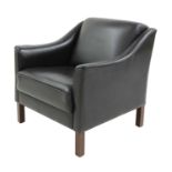 A black leather armchair,