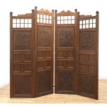 An Arts and Crafts oak four-fold dressing screen,