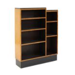 An Art Deco bird's-eye maple, walnut and ebonised bookshelf,