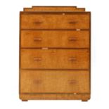 An Art Deco walnut and maple chest of drawers,