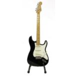 A 1989 Fender Stratocaster electric guitar,